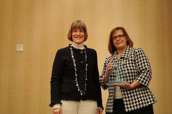 Letha Hammon, DuPont, and representative from Freescale Semiconductor, Inc. accepting award